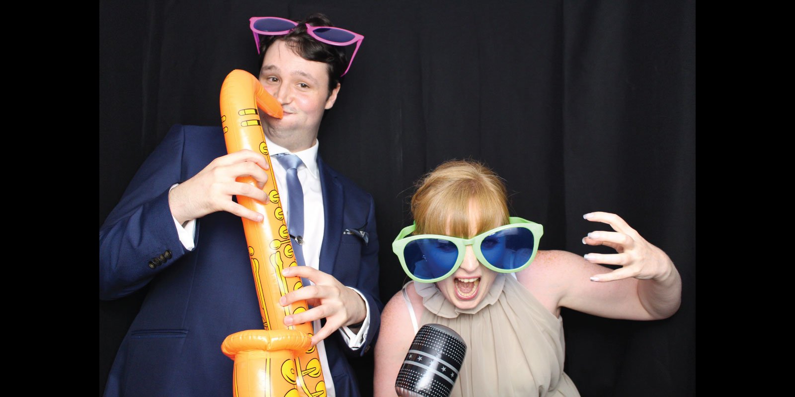 Guests enjoying a Cheesy Smiles photo booth